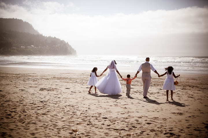 Wedding family walking on Beach